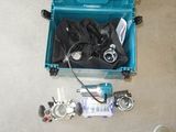 a blue box filled with scuba equipment on the floor
