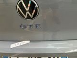 a sticker on the back of a car that has a vw logo on it