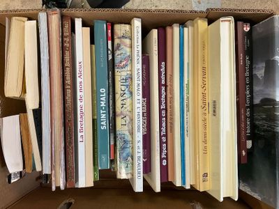 a box full of books sitting on a table