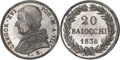 a silver coin with a portrait of a man on it