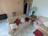a living room with two couches and a coffee table