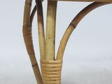 rattan side table with marble top and wicker base