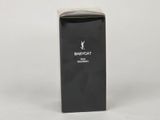 a black box with a white logo on it sitting on a white surface