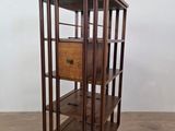 an image of a wooden display case with a drawer on top of it