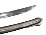 two knives that are sitting side by side on a table