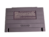 a nintendo game console sitting on top of a white surface