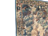 a tapestry hanging on the wall of a room