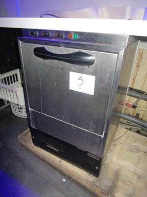 an image of a dishwasher sitting on top of a counter