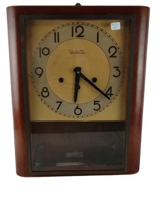 a clock that is hanging on the wall in the room
