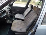 a picture of the inside of a car with the seats down