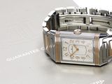 a watch that is sitting on top of a piece of paper