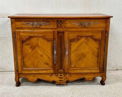 a wooden cabinet with two doors on top of it