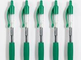 four green pens are lined up in a row on a white surface