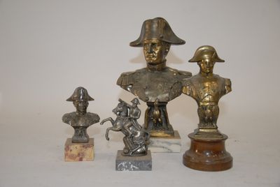 a lot of statues that are sitting on a table