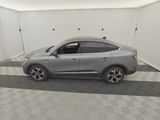 2020 nissan qx - v in a clean garage with a checkered floor