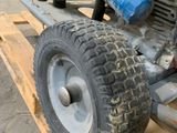 a close up of a small engine on a pallet