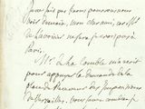 une vieille lettre manuscrite écrite à l'encre noire sur un morceau de papier