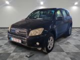 a picture of a black toyota rav parked in a garage