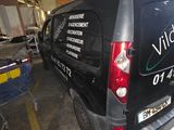 a van that is parked in a parking lot