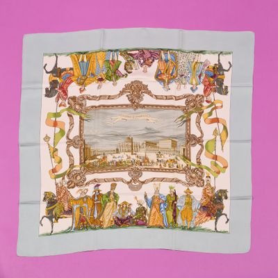 a picture of a square scarf with a picture of a town on it
