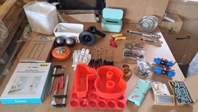 a table with a lot of tools and supplies on it