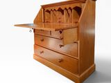 an image of a wooden desk with a drawer underneath it