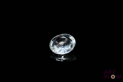 an image of a clear crystal ball on a black surface