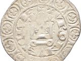 a close up of a coin with a design on it