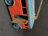 a toy bus that is sitting on top of a table