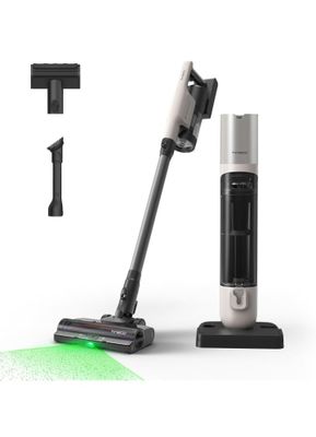 a close up of a vacuum cleaner with a green light on it
