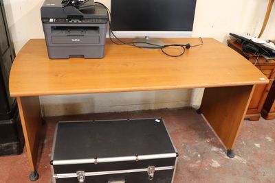 a computer and printer sitting on a wooden desk