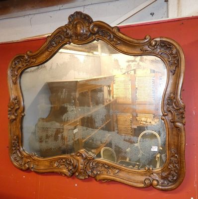 a mirror hanging on the wall in a room