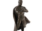 statue of a man with a cape on his head and a cape around his neck