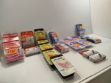 many different types of toothbrushes and toothpaste on the counter