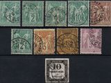 several different types of stamps are displayed on a black surface