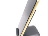 a cell phone that is sitting on a stand
