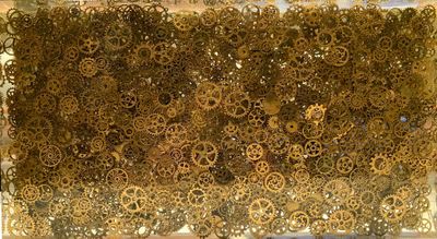 a picture of a piece of art made out of gears