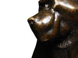 a statue of a monkey that is sitting on a table