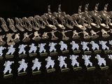 a close up of a bunch of toy soldiers on a table
