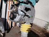 a motor bike that is parked in front of a building