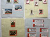 several different types of stamps on a piece of paper on a wall