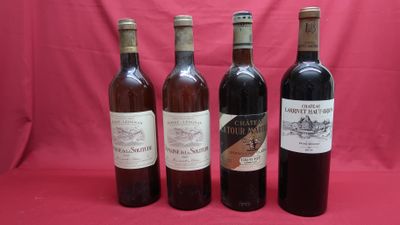 four bottles of wine are lined up on a red background