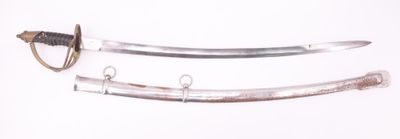 two swords on a white surface one has a black handle and the other has a brown handle