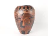 a vase with a picture of a woman and a man on it