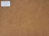 a close up of a piece of brown fabric with a price tag on it