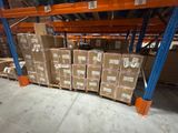 boxes are stacked on pallets in a large warehouse filled with pallets
