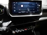 the dashboard of a car with a digital display in the center
