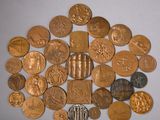 a lot of coins that are laying on a table