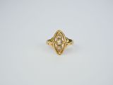 an image of a gold ring with a diamond in the center