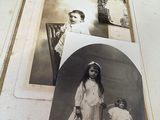 an old photo of a little girl and a little girl